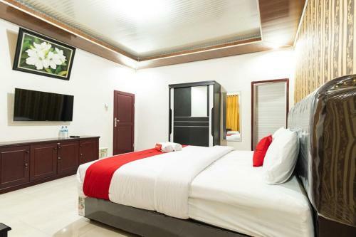 Hostal Reddoorz Plus Near Universitas Methodist Medan