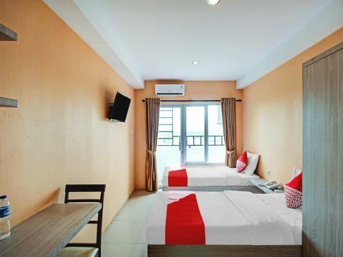Hotel Oyo 90245 Tridasa
