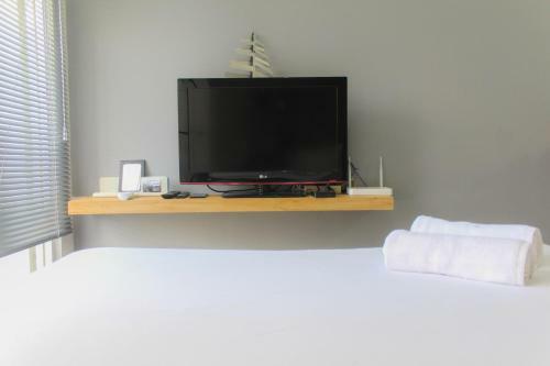Artistic Studio At Emerald Bintaro Apartment By Travelio