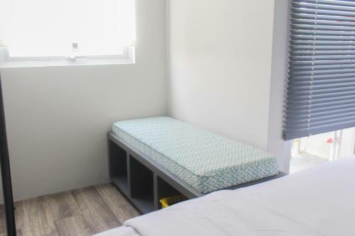 Artistic Studio At Emerald Bintaro Apartment By Travelio