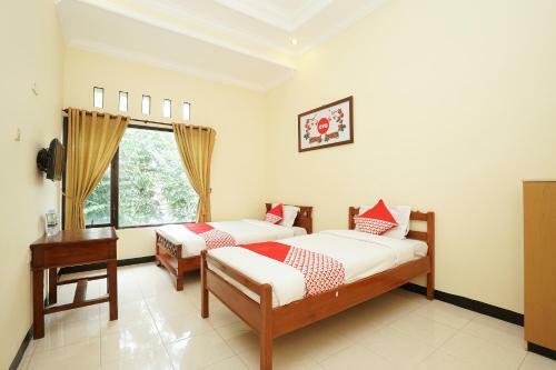 Hotel Oyo 587 Penginapan Sinar Harapan
