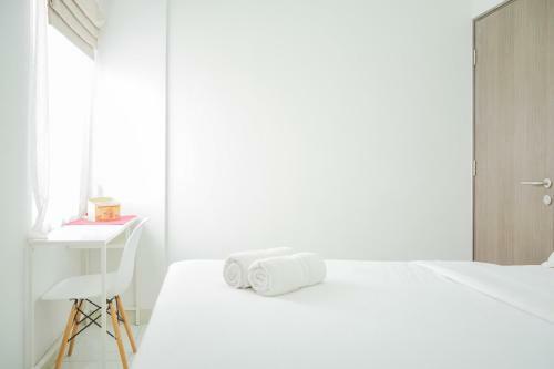 Minimalist 2br At Emerald Bintaro Apartment By Travelio