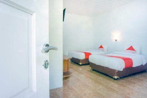 Hotel Oyo 2186 Tongging Beach