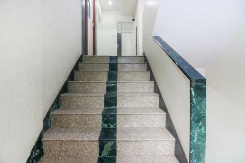 Capital O75414 Hotel Dream Residency