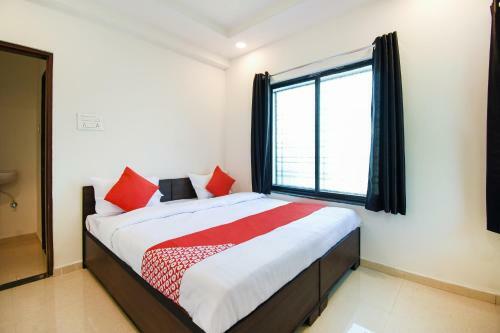 Hotel Oyo 47606 White House Regency