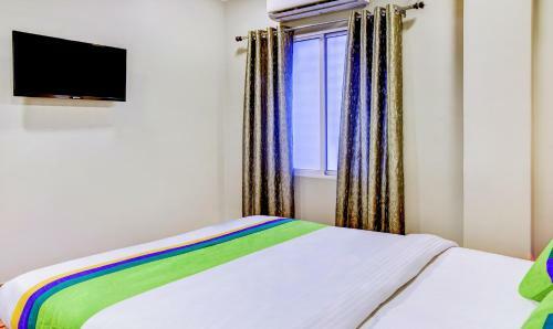 Hotel Treebo Trip Mittal Gardens