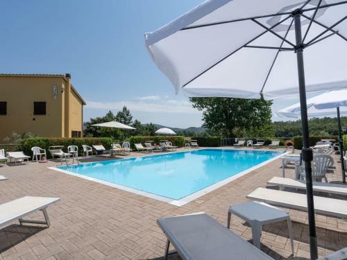 Villa Surrounded By The Beautiful, Sloping Tuscan Landscape