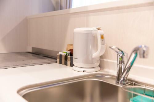 Aparthotel Grand Base Hiroshima Ekimae