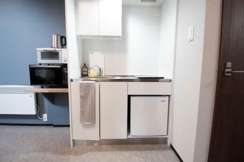 Hotel Uchi Living Stay Kcu