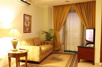 Hotel Travellers Suites Serviced Apartments