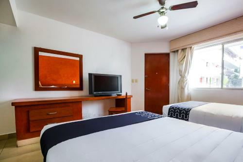 Hotel Capital O Continental II