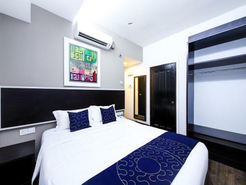 Capital O 978 Midaris Hotel