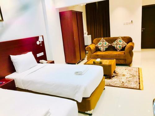 Apartamento Aljawhara Inn Hotel