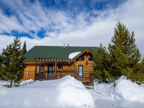 Miles Behind Log Cabin