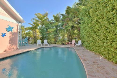 Tropical Island Waterfront Dream Home With Private Pool