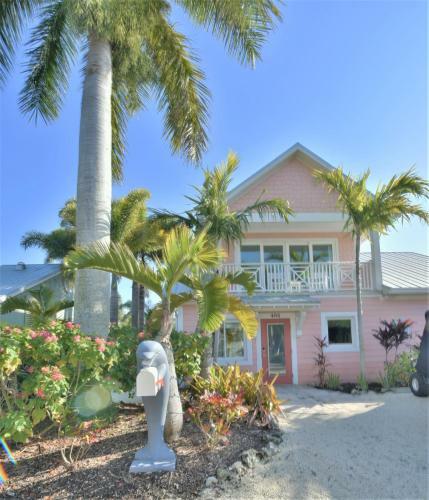 Tropical Island Waterfront Dream Home With Private Pool