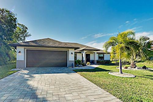 Canal-front Getaway - Boat Dock & Heated Pool Home