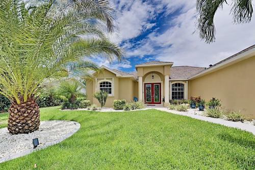 Canalfront Beauty With Private Heated Pool & Garage Home