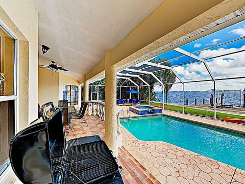 Riverfront Paradise With Caged Pool, Hot Tub & Dock Home