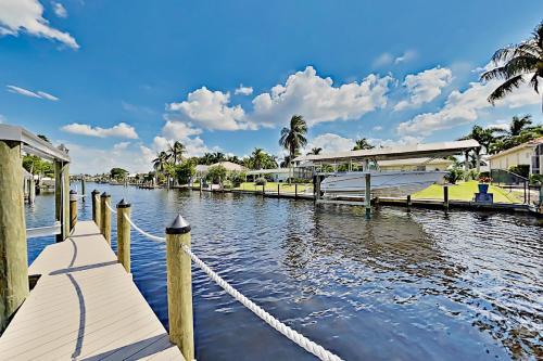 Chic Canal-front Home - Heated Pool, Private Dock Home