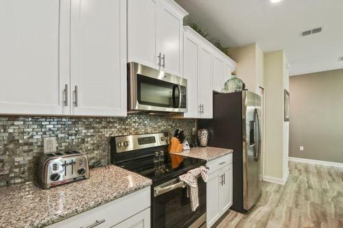 Modern 4 Bed 3 Bath Townhome In Championsgate Golf Resort