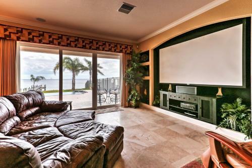 Riverfront Titusville Resort Home With Infinity Pool
