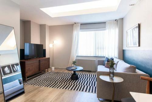 Apartamento Abode Vue At 3rd 1-bedroom Loft-style Suite