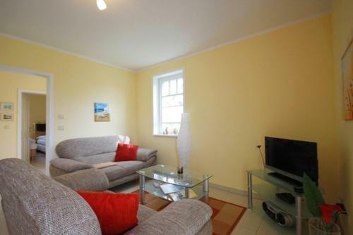 Apartamento Achtern Diek - Ferienwohnungen