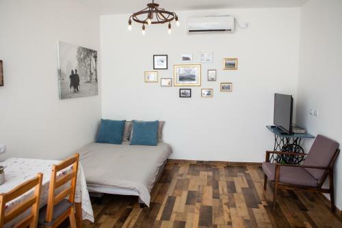 Lodge Olive - Israeli Zimmer