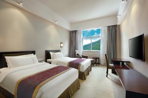 Hotel Ramada Encore Daocheng Yading