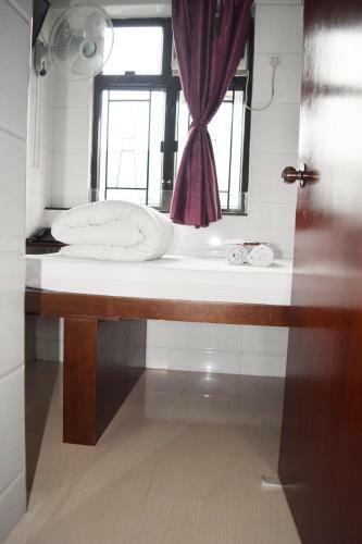 Hostal Pay-less Guesthouse