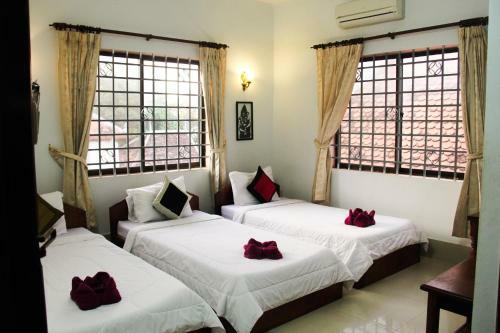 Hostal Tropical Breeze Guesthouse