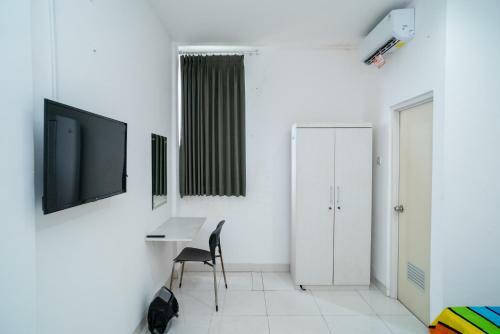 Hotel Living Kost Syariah Redpartner