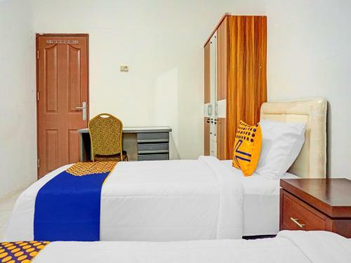 Hotel Spot On 90295 Simprug Residence