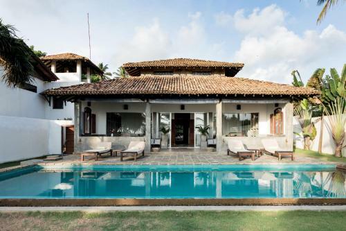 Green Parrot Beachvilla - Private Pool - 6 Pers