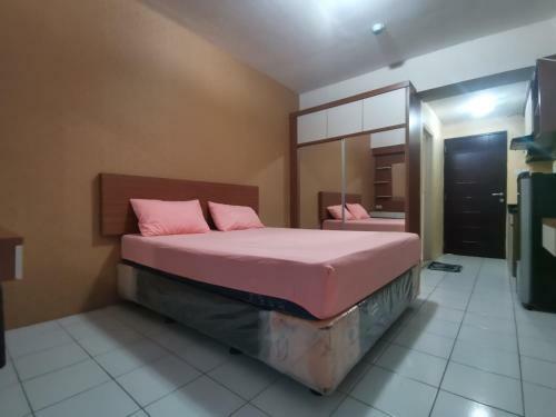 Cari 002 Emerald Tower Apartment