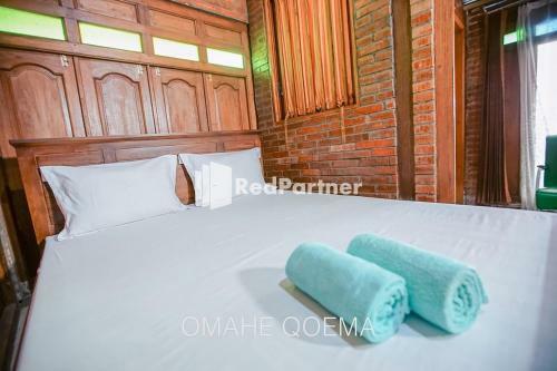 Hotel Omahe Haji Qoema Syariah 3 Redpartner