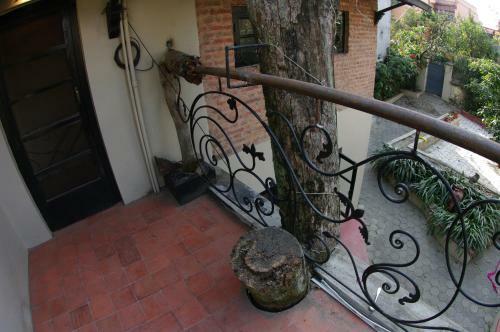 Hostal Laughing Buddha Hotel & Garden Theater