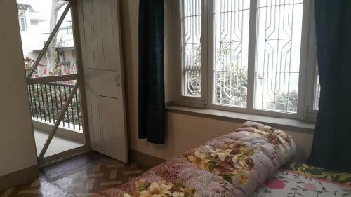 Hostal Laughing Buddha Hotel & Garden Theater