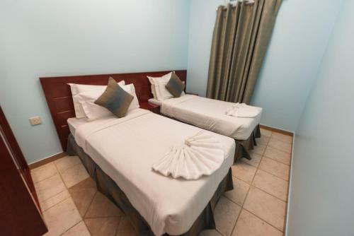 Apartamento Lafontaine Durrat Al-hada Suites