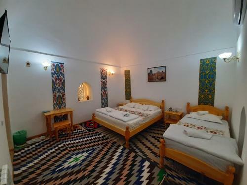 Hotel Madrasah Polvon-qori Boutique
