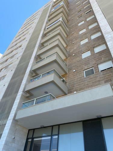Acre New 3 Bedrooms Beachfront Apartment
