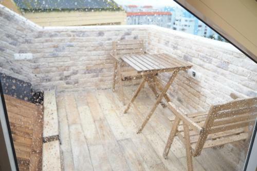 Tiny And Cute Apartment In The Roof Touching Border