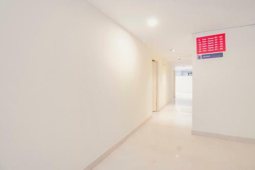 Capital O 77528 Smile Hotels