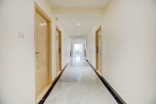 Capital O 77459 Smile Hotels
