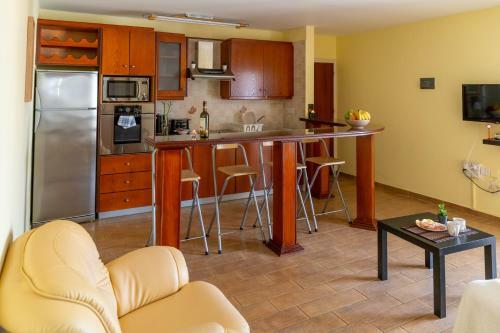 Gold Feathers Apartment