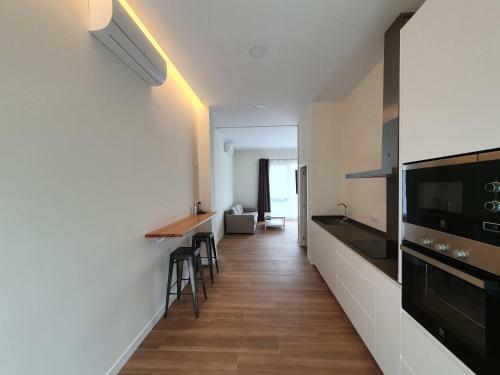 Redondela Apartments - Bedroom, Bathroom & Kitchen