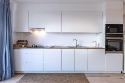 Spacious And Sunny Apartment With Large Terraces And Private Parking