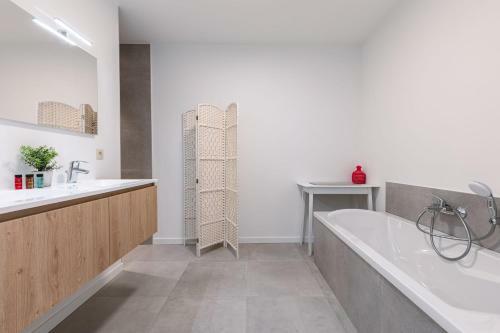Spacious And Sunny Apartment With Large Terraces And Private Parking