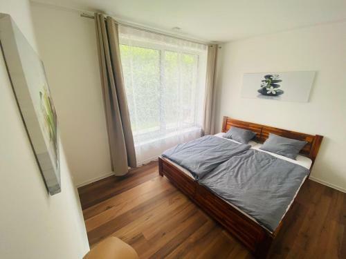 Woody Apartm�n ?ern� D?l